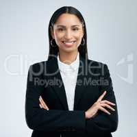 Youll get more money, but you cannot get more time. a confident young businesswoman standing against a grey background.