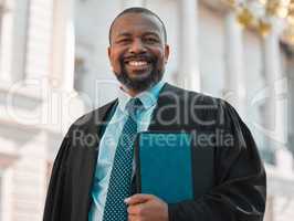 Theres a long road to success. a mature male lawyer preparing for court in the city.