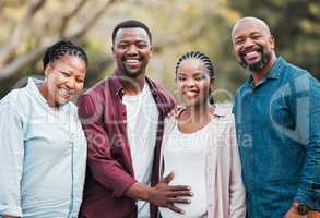 Growing family by one more member. a family celebrating their daughter in laws pregnancy.