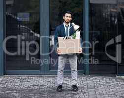 There is no failure except in no longer trying. a young businessman looking depressed after being retrenched from work.