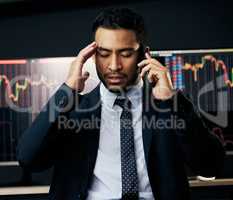 If you dont try at anything, you cant fail. a young businessman making a phone call in order to monitor the stock market.