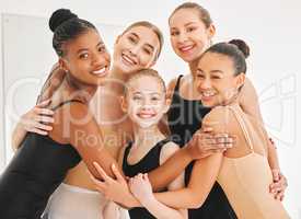 The best of friends are found at ballet class. a group of young ballet dancers having fun in a dance studio.