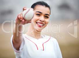 Time for a curve ball. Cropped portrait of an attractive young female baseball player standing outside.