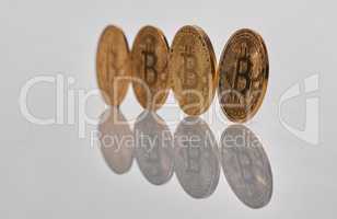 If we command our wealth, we shall be rich. Studio shot of a few coins against a grey background.