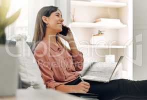 You must gain control over your money. a young woman using a phone and laptop at home.