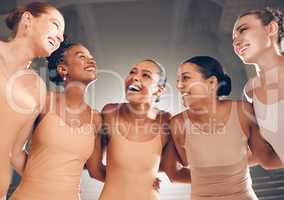 Find the way to be yourself in your art. a group of ballet dancers laughing together on a stage.