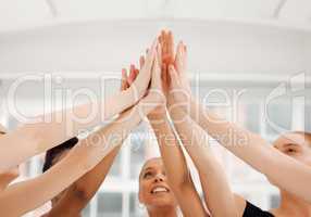 I dont shine if you dont shine. a group of ballet dancers giving a high five while standing together.