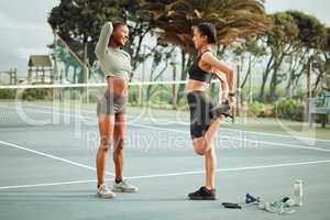 We always start with the warmup. Full length shot of two attractive young female athletes warming up outside before beginning their workout.
