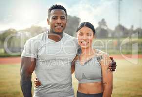 This is what a healthy relationship looks like. Cropped portrait of an athletic young couple standing together outside during their workout.