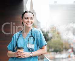 Every doctor needs their daily dose of caffeine. a young female doctor having a coffee at work.