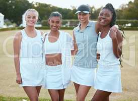 Its not just another day, its game day. a group of young women out to play tennis.