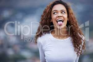 Tastes like freedom. an attractive young woman out for an early morning hike in the mountains.