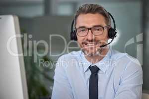 Your work ethic will get you further than your qualifications. Portrait of a mature male call center agent working in a modern office.