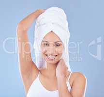 Let me tell you about my beauty routine. a beautiful young woman posing with a towel wrapped around her head.