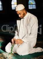 We are to pray in times of prosperity. a young muslim male praying in a mosque.