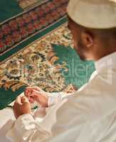 You ought to have some great faith. a unrecognizable muslim male praying in a mosque.