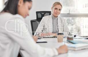 Find a group of people who challenge and inspire you. a group of colleagues having a discussion in a office.