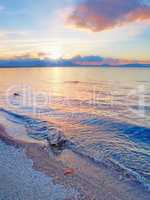 Beach, water and ocean view of blue sky and clouds at sunrise. Nature landscape of calm, stressless and peaceful sea in summer. Cloudy seaside tides and currents on a bright and beautiful day.