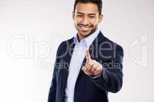 Growing his brand across multiple digital platforms. Studio shot of a young businessman connecting to a user interface against a white background.