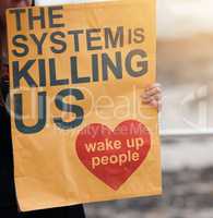 Misinformation is the biggest threat to humanity. Cape Town, South African - October 2, 2021 Unrecognisable demonstrators holding up signs during a protest.