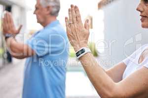 Maintain your focus as you find your peace. Closeup shot of a mature couple meditating together outdoors.