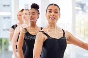 Being a dancer requires dedication. a group of beautiful young ballerinas.