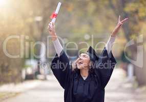 Let everything youve learned carry you far. a young woman cheering on graduation day.