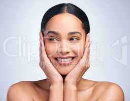 Self care Sunday. a beautiful young woman posing against a grey background.