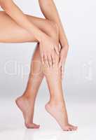 Legs have never been smoother. Studio shot of an unrecognizable womans legs against a grey background.