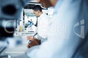 The worlds best medicine came from here. a young scientist conducting medical research in a laboratory.