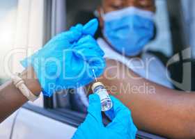 Covid, medical worker and vaccine site and service for patient getting flu shot or dose for coronavirus prevention. Man in car with face mask to avoid contact while getting injection