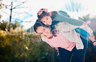 Mom will help you achieve anything you want. a young mother and daughter spending time together in a park.