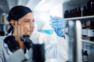 Youre going to change a lot of lives for the better. a young scientist conducting medical research in a laboratory.