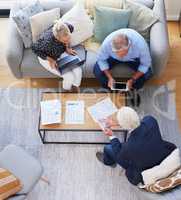 This is important to remember. Aerial shot of a group of businesspeople going through paperwork.