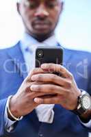 There is always something you can do and succeed at. a young business man using his cellphone outside.