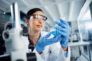 Life looks a lot better thanks to her research. a young scientist conducting medical research in a laboratory.