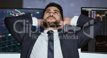 Businessman taking a break from trading on the stock market during a financial crisis. Trader in a bear market thinking, relaxing and making a decision. Market crash and economy recovery