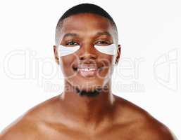 I just need a way out of my head. Studio portrait of a handsome young man wearing an under eye patch against a white background.