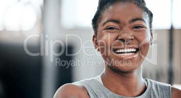 Be with them, I dont compete. Portrait of a young beautiful woman taking a break from her workout in the gym.