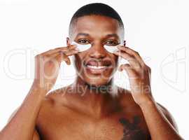 I think we just might be alright. Studio portrait of a handsome young man wearing an under eye patch against a white background.