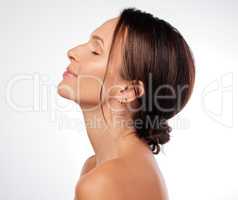 I became free once I accepted myself. an attractive young woman posing alone in the studio.