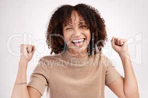 Sometimes, I impress myself. Cropped portrait of an attractive young woman cheering in studio against a pink background.