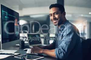 Dont celebrate in clubs what you pray for in churches. Portrait of a man using a computer in a modern office.