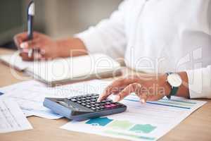 Finance, accounts and data analyst planning for tax return and calculating new financial strategy. Professional accountant working with bank reports and invoice charts to calculate income money