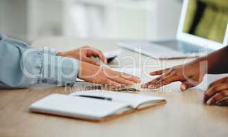 Closeup of money and payments paid between a customer and business owner on a table or desk. Client buying, shopping or using cash to pay a lawyer, agent or worker for a professional job service