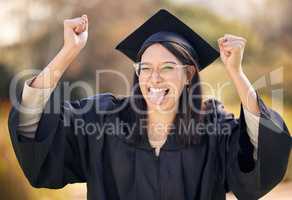 Guess who got her degree...me. a young woman cheering on graduation day.