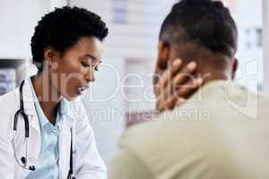 Okay, lets see how best to treat this. an attractive young female doctor doing consult with an unrecognizable male patient in her office.