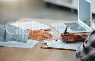 Contract, document and paper work closeup of banker with client signing, writing or filling out information on insurance or loan form. Bank worker giving client instruction on banking law agreement