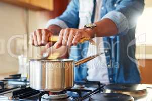 I think I cracked the perfect spaghetti code. a man breaking spaghetti before boiling it.