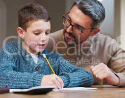 Ill always be your biggest cheerleader. a father helping his son complete his homework.